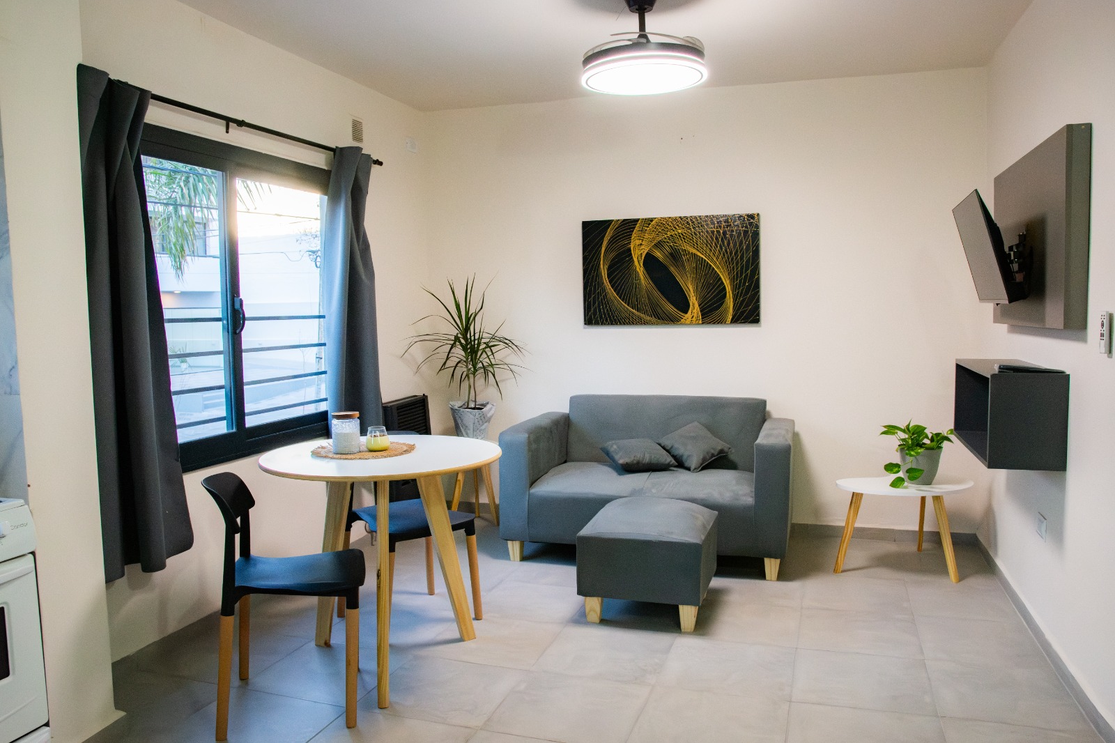 Living y comedor de una unidad Dimora